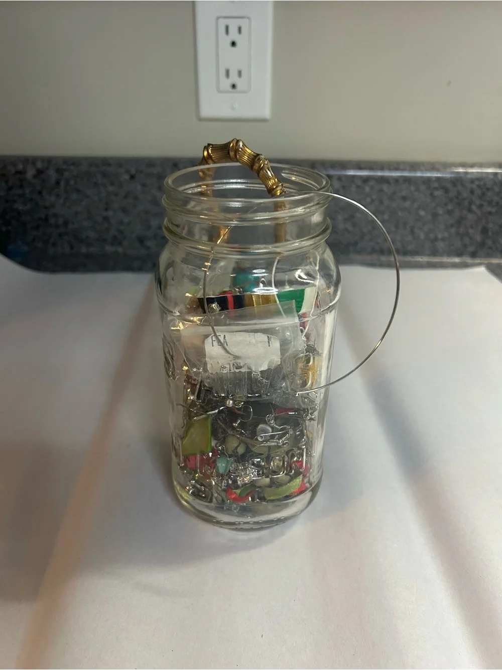 Jar full of crafting jewelry. Vintage to modern.